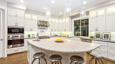 $750,000+