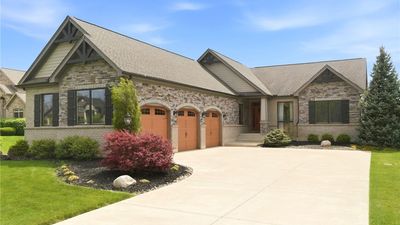 Sold Listings Crafted with elegant stone and brick, this home pr